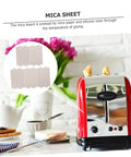 Mica sheets for microwave oven next to red toaster in kitchen setting.