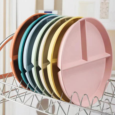 Five Pack 9 Inch Unbreakable Portion Control Plates With Three Compartments Reusable BPA Free Dinner Plates on a drying rack