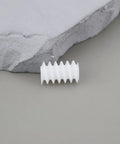 Close-up of a white 10mm worm gear from the 50 Pack 6mm Plastic Cog Gears Set 0.5 Module 10mm Worm Gears for 2mm Motor Shafts