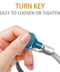 Person using a turn key clamp on Heavy Duty 4 Inch By 20 Foot Flexible Clear PVC Dust Collection Hose With Carbon Steel Wire Coil For Dust Collectors