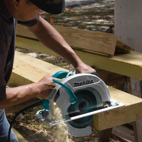 Worker using Ten And One Quarter Inch Circular Saw With Beefy 15 Amp Motor Delivers 4,300 RPM For Fast Clean Cuts Through Beams