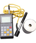 Heavy Duty Portable Digital Brinell Hardness Tester For Metal And Alloy Analysis Featuring Rock Solid Stainless Steel Build Big Time Precision Sunlight Ready LCD Screen Smooth Operator Crank Handle Top Shelf Hardware Tool with yellow cable and probe.