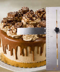 Cake Scraper And Leveling Tool Set Stainless Steel With PP Handle Adjustable Frosting Spatula Pro Grade next to a chocolate cake