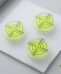 SILENRADAWN Small Circular Bubble Levels 3 Piece Round Spirit Level Layout featuring three compact, clear bubble levels with yellow markings.