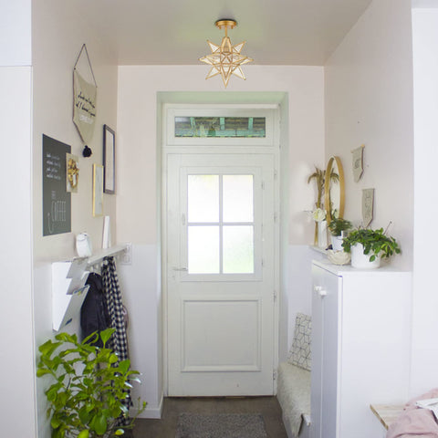 Brushed Gold Moravian Star Ceiling Light With Seeded Glass Semi Flush Mount For Foyer And Hallway in a bright entryway