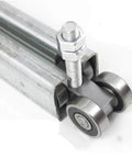 Close-up of Heavy Duty Sliding Door Hanging Wheel Set For Industrial Warehouse And Plant Use, showing orbital track bearing.
