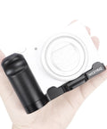 L-Shaped Grip For Sony ZV-1 II And ZV-1F Vlog Cameras With Black ARCA Extension Bracket in hand view with camera attached