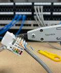 Pro Grade Impact Punch Down Tool And Integrated Wire Stripper RJ45 Crimping Kit For Cat6 Cat5e Ethernet Cables Quick Trim Action For Keystone Jacks Faceplates Hustle Ready Wiring Beast in use with keystone jack and cables.