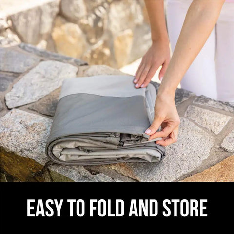Person folding Waterproof Large Outdoor Patio Sofa Cover For 3 Seater 80 Inch Heavy Duty 600D Furniture Cover With Interlocking Seams