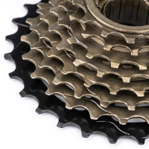 Close-up view of Beefy 8 Speed 13 To 28T Bicycle Freewheel With Threaded Freehub Replacement Part For Road And Mountain Bikes Brass Black Finish