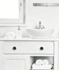 Dope Green Hexagon Cabinet Knobs For Drawers And Cupboards Built Like A Brick Wall Durable Zinc Alloy Furniture Handles With Sleek Marble Finish Replacement Hardware For Kitchen Bedroom Bathroom Top Shelf Home Refresh on a white bathroom vanity.