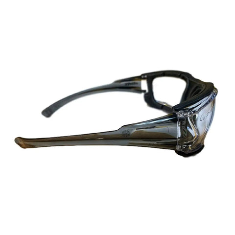 Side view of Oversized Anti Fog Safety Goggles Featuring Vented Temple Slots And Hella Soft Eva Foam Seal For No Sweat Wraparound Vision And Knockout Job Site Protection Pack Of Twelve.