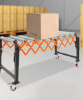 Heavy Duty Expandable Conveyor Roller Table With Adjustable Telescopic Flexible Design For Warehouse Shipping Docks with a box on top.