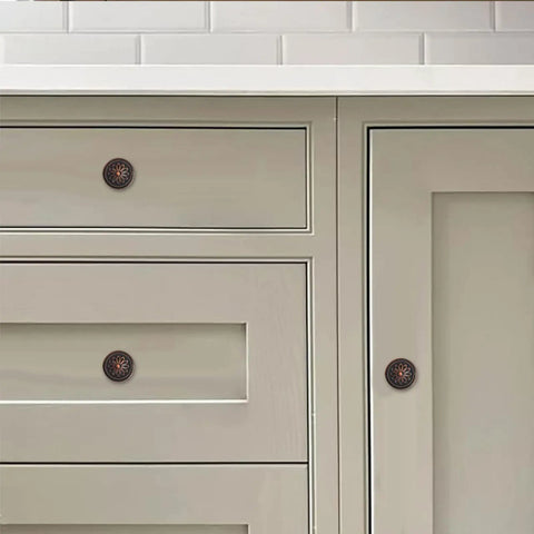 Oil Rubbed Bronze Cabinet Knobs With Backplates, 2.5 Inch, 2 Pack, on a beige kitchen cabinet and drawer