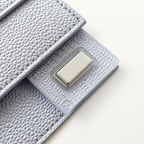 Heavy Duty Rectangular Magnetic Buttons Hidden Clasp Set Hella Secure For Leather Bags Jackets And Luggage 10 Pack showing silver clasp on textured fabric.