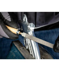 Using Six Piece Four Inch Key File Set With Handy Wooden Handles In Protective Plastic Pouch For Fine Filing on metal