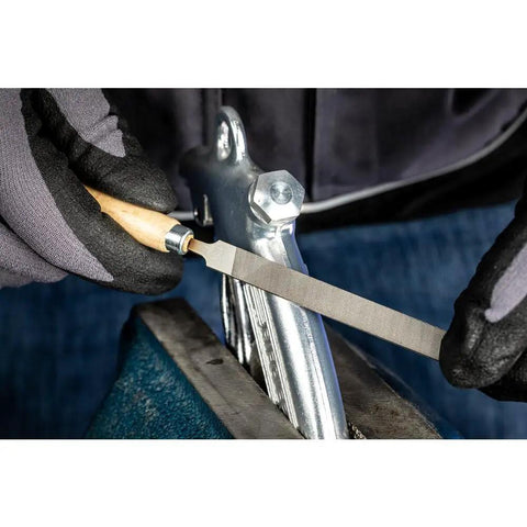Using Six Piece Four Inch Key File Set With Handy Wooden Handles In Protective Plastic Pouch For Fine Filing on metal