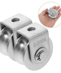 Two Pack Stainless Steel Pulley Wheel With Bearing, Heavy Duty Industrial Door Track Crane Roller for Gym Equipment and Sliding Gates, shown in hand for scale.