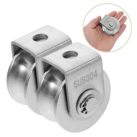 Two Pack Stainless Steel Pulley Wheel With Bearing, Heavy Duty Industrial Door Track Crane Roller for Gym Equipment and Sliding Gates, shown in hand for scale.
