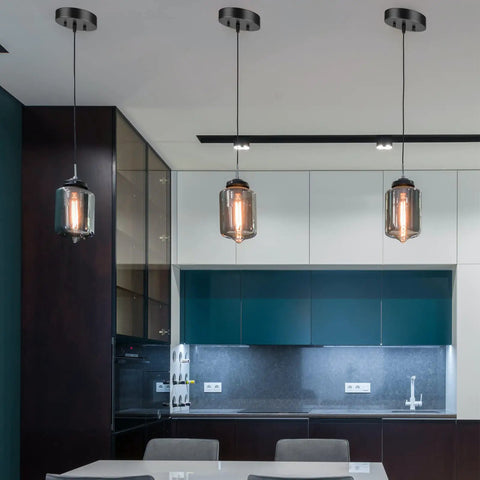 Modern kitchen with three pendant lights using Six Inch Black Ceiling Canopy Kit For Pendant Lights And Chandeliers.