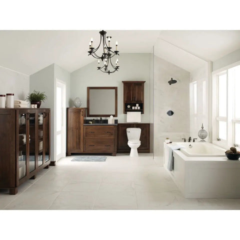 Bathroom with wooden cabinetry, bathtub, and chandelier, featuring Four Light Pendant In Brushed Nickel Finish With White Silk Mylar Shade