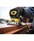 Person using Beast Electric Sander 1/4 Sheet With 14,000 OPM And 2.3 Amp Motor, Rubber Overmold Handle with improved paper clamp on wood