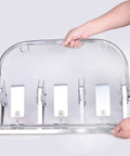 Person holding Folding Cable Payoff Stand With Three Quarter Reels For Construction Sites And Home Wiring Heavy Duty Reel
