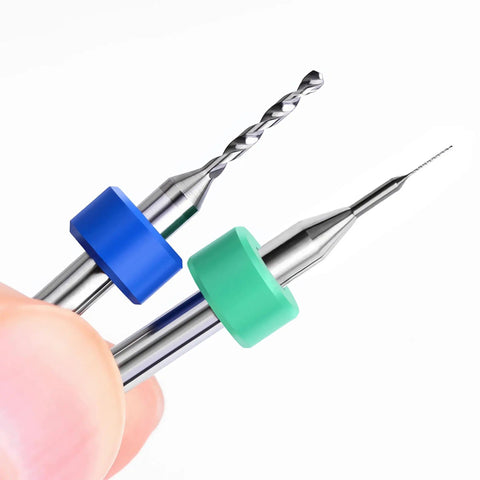 Close-up of two drill bits from 10 Pcs PCB Drill Bit Set With One Eighth Inch Shank Micro Twist Carbide Bits 1.1mm To 2.0mm For PCB Engraving.