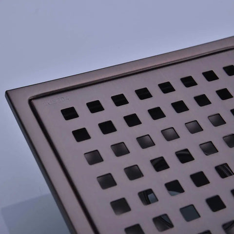 6 Inch Square Shower Floor Drain Brushed Bronze 304 Stainless Steel With Threaded Adapter Removable Grid Grate heavy-duty design close-up view.