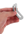 Hand holding stainless steel L shape shelf bracket for wood shelves and tables adjustable slot design for precise alignment angled corners
