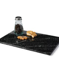 Natural Black Marble Cutting Board 12 By 8 Inch Real Stone Slab with jar and cookies on kitchen display tray.