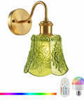 YUNICE Rechargeable Wall Sconces Set of 1 Battery Operated Wall Sconce with Remote Control Dimmable Cordless Wall Lamp with Green Glass Lampshade Antique Brass Wall Lights for Bedroom Living Room mounted on wall with green glass shade.