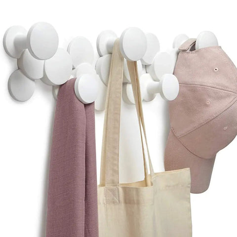 Slick Scandinavian Wall Mounted Coat Hooks Knockout Resin Organizer with white hat, scarf, and tote on display.