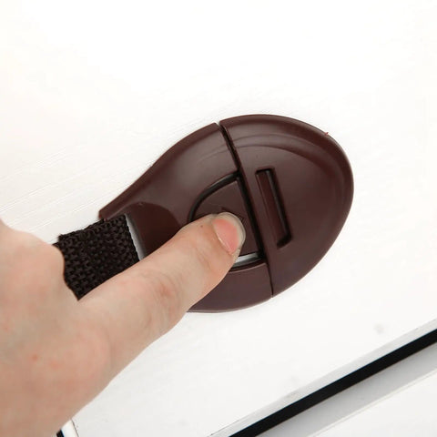 Easy Peasy Baby Proofing Locks 4 Pack For Cabinets, Drawers, And Fridge Belt Design Adhesive Safety Locks in use on cabinet
