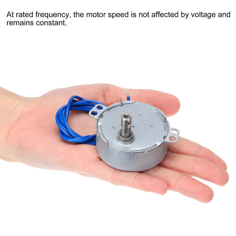 Tiny But Mighty Synchronous Gear Motor 100-127V AC 10-12 RPM 4W in hand, showcasing compact design