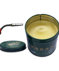 Open can of Nozzle Cleaner Gel 200g For Welding Spatter And Flux Removal shown beside a welding nozzle.