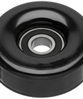 Front view of black metal automotive idler pulley with bearing
