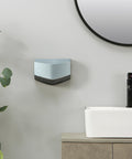 Lightning Fast Hand Dryer For Home And Commercial Bathrooms, Touchless Operation, mounted on a bathroom wall beside a sink