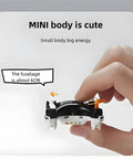 Hand holding compact mini drone with easy stunt flights and 360 degree tricks for beginners indoor outdoor quadcopter.