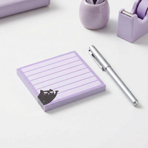 Black Cat Sticky Notes 3x3 Set For Back To School And Office with pen, purple memo pads featuring a black cat design on a desk