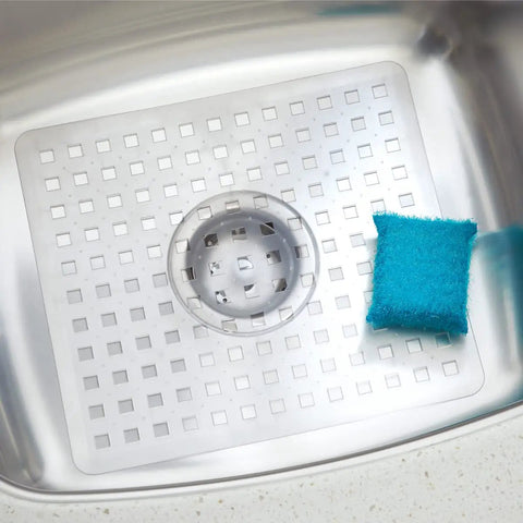 Clear Plastic Sink Grid Protector For Kitchen And Laundry Sinks Open Wire Design 11 By 12 And A Half Inches in a stainless sink.