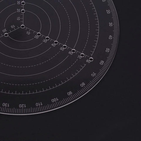 Close-up of VISLONE clear acrylic round center finder compass with circle gauge for drawing circles on wood turning.