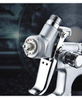 Mini Pneumatic Paint Sprayer Featuring 1.0 Mm Brass Flow Cap And Corrosion Resistant Needle For Straightforward Auto Detailing And Slick Finish Airbrush Jobs Built Tough For Top Shelf Durability, close-up of spray gun nozzle.