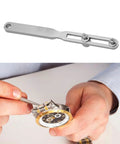 Adjustable Watch Back Remover Tool With Wrench Style Case Back Opener Kit in use for watch battery replacement.