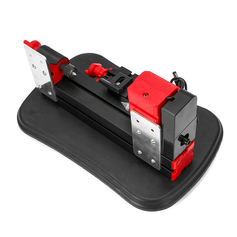 Super Cool Mini Metal Lathe Machine 12V 36W With Gong Bed For Tinkering, Woodworking, And Modelmaking at an angle on a black surface.