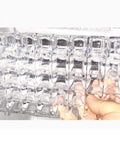 Bad Ass High Capacity Ice Maker Pumping 55 Kilos Of Round Cubes Daily showing clear ice cube tray filled with ice.