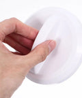 Close-up of hand gripping Super Cool Sosoport Switch Knob For Vending Machines And Playgrounds Sturdy Plastic party game accessory.