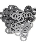 Top Shelf PTFE Coated Nylon Washers 5X8X0 5Mm Set Of One Hundred Pieces For Traxxas RC Cars, close-up view showing shiny black washers.