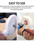 Front view of white buffing wheel on a spindle with a white polishing block
Side view of red coarse polishing brick pressed against a wheel mounted on a drill