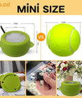 Compact Portable 2.5 Inch Mini Electric Hot Glue Pot 35W Fast Heating Up To 380 Fahrenheit For On The Go Small Crafts Beads Floral Arrangements Wreaths Wax Pellets Sticks Dipping Stems And More, shown with plug and size comparison with tennis ball.